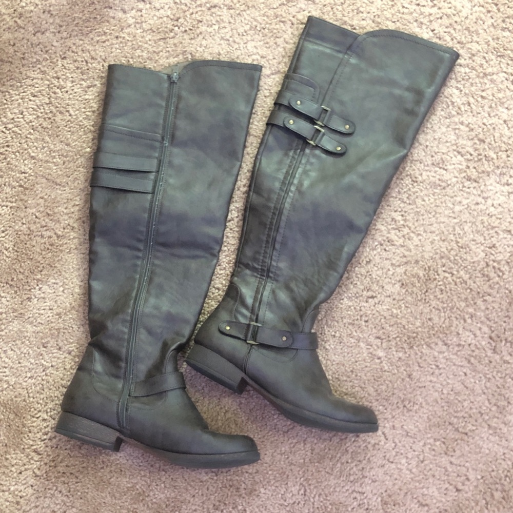 Over the knee strappy buckled boots